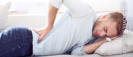  Eine Gürtelrose tritt häufig in der Rückengegend auf.